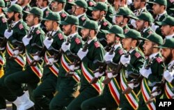 IRAN -- In this file photo taken on September 22, 2018 shows members of Iran's Revolutionary Guards Corps (IRGC) marching during the annual military parade which marking the anniversary of the outbreak of the devastating 1980-1988 war with Iraq