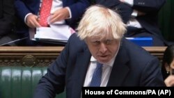 British Prime Minister Boris Johnson says no U.K. government minister will attend the Beijing Olympics, Dec. 8, 2021. (House of Commons/AP)