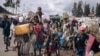 War-displaced people flee towards the city of Goma, eastern Republic of Congo, Nov. 15, 2022. (ALEXIS HUGUET / AFP)