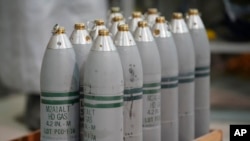 Canisters of mustard gas, which are part of the United States' chemical weapons stockpile, wait for destruction at the U.S. Army Pueblo Chemical Depot Thursday, June 8, 2023, in Pueblo, Colorado. (AP Photo/David Zalubowski)