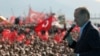 Turkish President Tayyip Erdogan addresses his supporters during a rally ahead of the May 14 presidential and parliamentary elections, in Izmir on April 29, 2023. (Turkish Presidential Press Office/ via Reuters) 