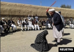 Taliban judge lashes a woman for adultery in Ghur province