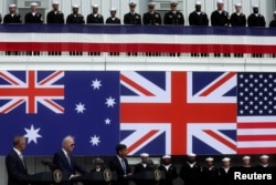 U.S. President Joe Biden, Australian Prime Minister Anthony Albanese and British Prime Minister Rishi Sunak deliver remarks on the Australia - United Kingdom - U.S. (AUKUS) partnership, after a trilateral meeting, at Naval Base Point Loma in San Diego, California U.S. March 13, 2023. (REUTERS/Leah Millis)