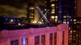 The "X" sign installed at formerly Twitter headquarters in San Francisco, July 28, 2023. X says it is trying to take action on a flood of posts sharing graphic media, violent speech and hateful context about the latest war between Israel and Hamas. (AP Photo/Noah Berger)