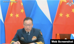 Video released by Russian government of China’s Defense Minister pledging China’s support to Russia; Photo credit: Newsweek