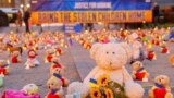 Members of the organization Avaaz and Ukrainian refugees installed teddy bears and toys in front of the European Commission to highlight the reported abduction of Ukrainian children by Russia. February 23, 2023, Brussels. (Avaaz via AP)