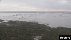 A view from a helicopter shows a flooded area in the Kurgan Region, Russia, in this still image taken from video released April 9, 2024. (Russian Emergencies Ministry via REUTERS)