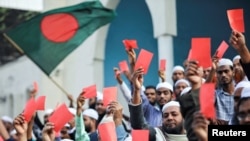 Supporters of the Islami Andolan Bangladesh party attend a rally at the Baitul Mokarram National Mosque in Dhaka on January 9, 2024, protesting what they called a "dummy election." (Mohammad Ponir Hossain/Reuters).