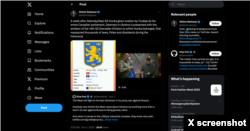 A screenshot taken of Afshin Rattansi's tweet taken on October 4, 2023, where he falsely claims Ukrainian President Ukrainian Volodymr Zelenskyy received an "emblem of the 14th SS Grenadier Division" from Ukrainian troops.