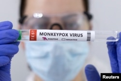 Test tubes labelled "Monkeypox virus positive" are seen in this illustration taken on May 23, 2022. (Dado Ruvic/Illustration/Reuters)