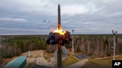 A Yars intercontinental ballistic missile is test-fired from a launch site in Plesetsk as part of Russia's nuclear drills on October 26, 2022. (Russian Defense Ministry Press Service/via AP)