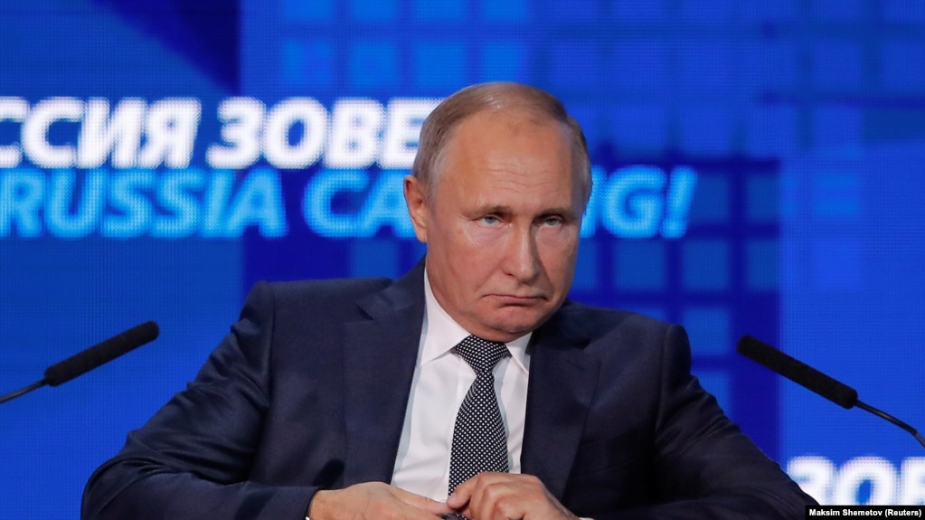 RUSSIA -- Russian President Vladimir Putin reacts during a session of the VTB Capital Investment Forum "Russia Calling!" in Moscow, November 28, 2018