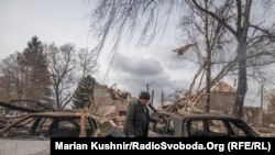 Aftermath of the shelling of the village of Byshiv, Kyiv region, on March 4, 2022. (Marian Kushnir/RFE/RL)