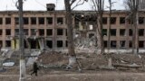 Completely destroyed lyceum building after a Russian rocket attacked the small city of Vasylkiv not far from Kyiv, Ukraine, March 7, 2022. (Mikhail Palinchak/EPA-EFE)