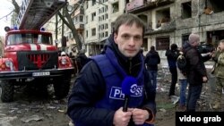 Kyiv authorities say a Russian shell hit a nine-story residential building in the Obolon district in the early morning hours of March 14.