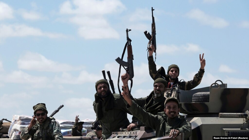LIBYA -- Libyan National Army (LNA) members, commanded by Khalifa Haftar, head out of Benghazi to reinforce the troops advancing to Tripoli, in Benghazi, April 7, 2019