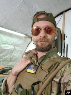 Eddy Etue, an American who left home for Ukraine to help in the fight against Russia, is shown in a self portrait taken on May 1, 2022. (Eddy Etue/AP)