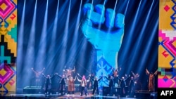 Ukrainian band Kalush Orchestra performs on stage during the 2022 MTV Europe Music Awards in Düsseldorf, Germany, Nov. 13, 2022.
