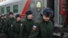 Russian conscripts called up for military service walk along a platform before boarding a train at a railway station in Omsk, Russia Nov. 27, 2022.
(Alexey Malgavko/REUTERS)