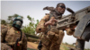 Soldiers of the Malian army during a patrol on a road between Mopti and Djenne, central Mali, Feb. 28, 2020. (AFP)