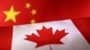 Printed Chinese and Canada flags are seen in this illustration, July 21, 2022. (REUTERS/Dado Ruvic/Illustration）