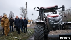 Polish President Andrzej Duda visits the site of an explosion in Przewodow, a village in eastern Poland near the border with Ukraine, on November 17, 2022. (Jakub Szymczuk/KPRP/Poland's President Office Handout/via Reuters)