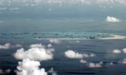 Image showing land reclamation of Mischief Reef in the Spratly Islands by China in the South China Sea on May 11, 2015. (Associated Press)