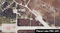 A satellite image by Planet Labs PBC shows Saki Air Base after an explosion there Wednesday, Aug. 10, 2022. (Planet Labs PBC/AP)