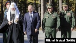 RUSSIA – Patriarch Kirill of Moscow, President Vladimir Putin, Defense Minister Sergei Shoigu, Valery Gerasimov, Chief of the General Staff of the Russian Armed Forces. Moscow Region, 19 Sep. 2018