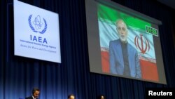 International Atomic Energy Agency (IAEA) Director General Rafael Grossi listens as head of Iran's Atomic Energy Organization Ali-Akbar Salehi delivers his speech at the opening of the IAEA General Conference at their headquarters in Vienna, Austria on September 21, 2020. (Leonhard Foeger/Reuters)