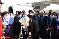 Cambodian Prime Minister Hun Sen is welcomed as he visits Naypyitaw, on January 7, 2022. (Cambodian Government/via Reuters)
