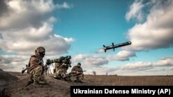 Ukrainian soldiers use a launcher with U.S. Javelin missiles during military exercises in Donetsk region, Thursday, December. 23, 2021.(Ukrainian Ministry of Defense Press Service)