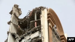 A view of the collapsed Metropol Building as rescue operations continued in the southwestern city of Abadan, Iran, on May 24, 2022. (AFP)