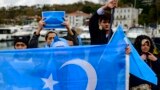 FILE - Members of Uyghur communities take part in a protest against China, near the Chinese consulate in Istanbul, on Dec. 4, 2022.