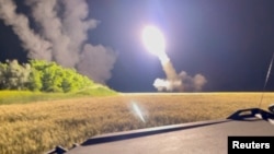 A High Mobility Artillery Rocket System (HIMARS) fires in an undisclosed location in Ukraine in this image from an undated social media video uploaded on June 24, 2022. (Pavlo Narozhnyy/via REUTERS )