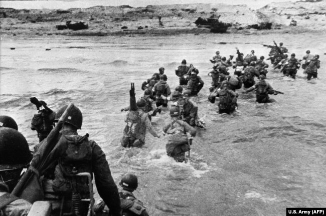U.S. troops landing as reinforcements during the historic D-Day, June 6, 1944.