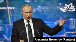 RUSSIA -- Russian President Vladimir Putin opens a plenary session of Eastern Economic Forum in Vladivostok, Russia September 5, 2019. 