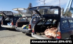 AFGHANISTAN -- Cars are loaded with the bodies of civilians who were allegedly killed in a military operation by the US forces, in Zurmat district of Paktia province, December 31, 2018