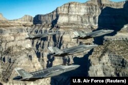 U.S. -- U.S. Air Force F-35 Lightning II fighter jets perform aerial maneuvers as part of a combat power exercise over Utah Test and Training Range, Utah, November 19, 2018