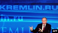 Russian President Vladimir Putin gives his annual press conference in Moscow, 20 Dec 2012.