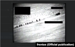 Belarusian border control allegedly helping migrants cross the border into Lithuania. (Frontex, via RFE/RL)