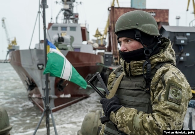 UKRAINE -- A Ukrainian serviceman stands on board a coast guard ship in the Sea of Azov port of Mariupol, eastern Ukraine, December 3, 2018.