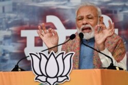 India's Prime Minister Narendra Modi speaks during a rally in New Delhi on December 22, 2019.