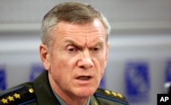 Russia’s Deputy Chief of General Staff Anatoly Nogovitsyn addresses the media in Moscow, August 13, 2008. Nogovitsyn said August 15 that Poland's agreement to accept a U.S. missile defense battery exposes it to attack, adding that Russia can use nuclear weapons if it has to.