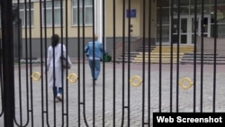 Entering a school in Moscow.