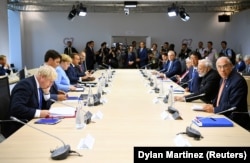 FRANCE -- G7 leaders attend a working lunch with world leaders during the G7 summit in Biarritz, France, August 26, 2019.