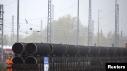 Germany -- A handout by Nord Stream 2 claims to show the first pipes for the Nord Stream 2 pipeline being delivered by rail to the German logistics hub Mukran on the island of Rugen, undated