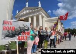 LITHUANIA -- People take part in a human chain protest in support of the Hong Kong Way, a recreation of a pro-democracy "Baltic Way" protest against Soviet rule three decades ago, in Vilnius, August 23, 2019