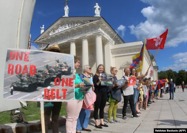 LITHUANIA -- People take part in a human chain protest in support of the Hong Kong Way, a recreation of a pro-democracy "Baltic Way" protest against Soviet rule three decades ago, in Vilnius, August 23, 2019