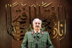 LIBYA-- Military strongman Khalifa Haftar gives a speech, saying he had "a popular mandate" to govern the country, declaring a key 2015 political deal over and vowing to press his assault to seize Tripoli, April 27, 2020.